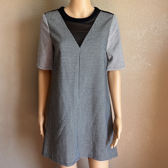 BCBGENERATION Black & White Checkered
Sheath Dress with Sheer V Neck Size XS - Picture 2 of 12